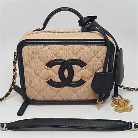 chanel filigree vanity case beige black|chanel vanity case bag small.